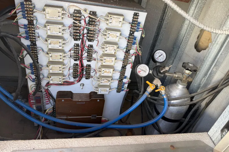 Slide: The Image of Electrical panel and gauges inside 2005 Twin Anchors 6816 Arizona Edition Yacht House. - 62