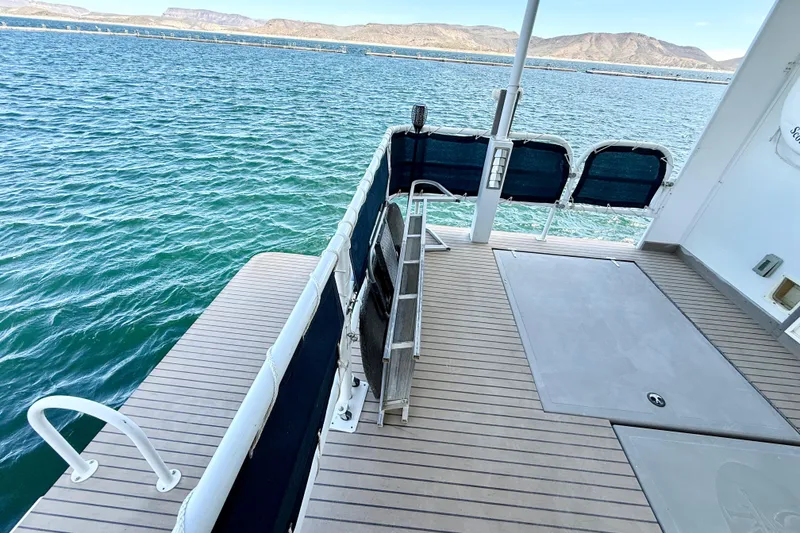 Slide: The Image of 2005 Twin Anchors 6816 Arizona Edition Yacht House deck with scenic water view. - 69