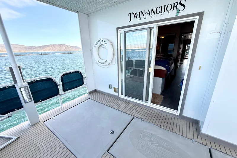 Slide: The Image of 2005 Twin Anchors 6816 Arizona Edition Yacht House with scenic lake view. - 70