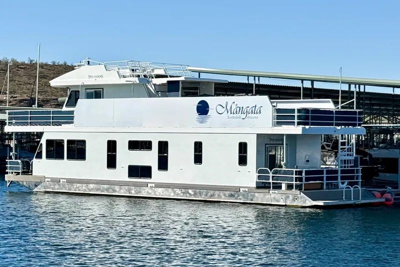 Slide: The Image of 2005 Twin Anchors 6816 Arizona Edition Yacht House on water, sunny day. - 80