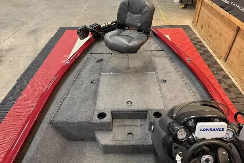 Slide: The Image of 2019 Tracker Pro Team 175 TXW boat interior with seating and Lowrance electronics. - 4