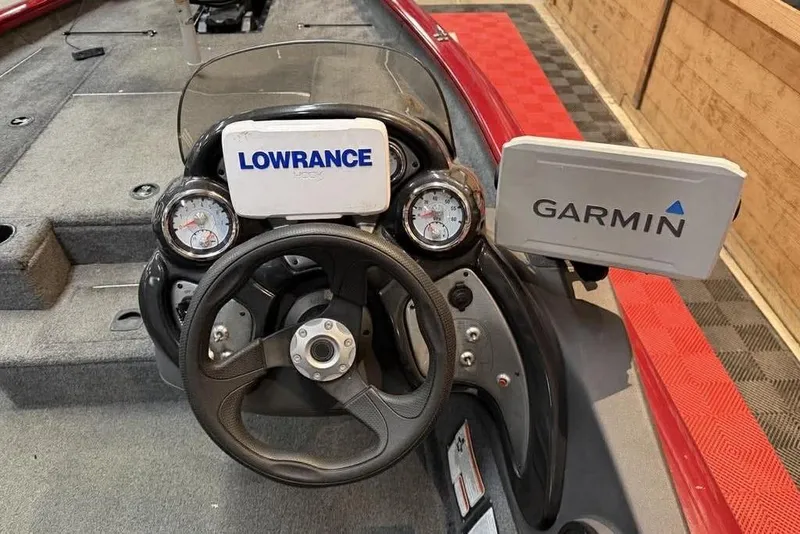 Slide: The Image of 2019 Tracker Pro Team 175 TXW boat dashboard with Lowrance and Garmin displays. - 5