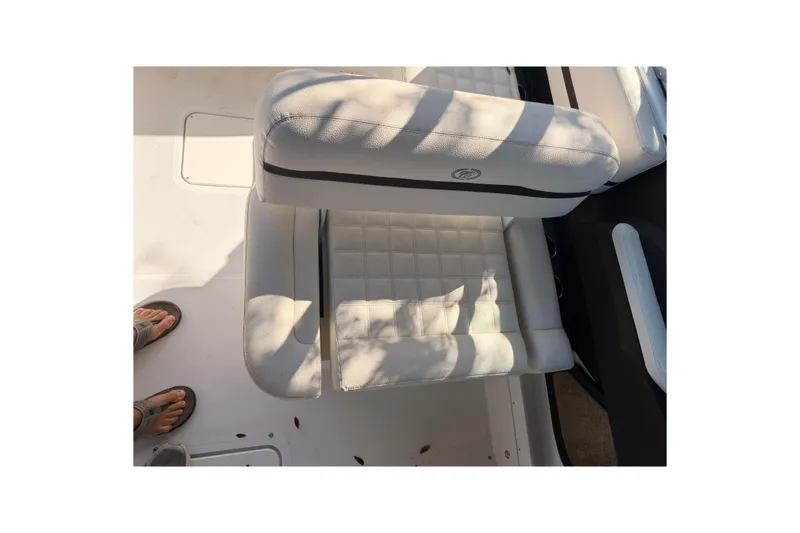 Slide: The Image of White leather seat on 2017 Cobalt R3 boat, with shadow patterns. - 18