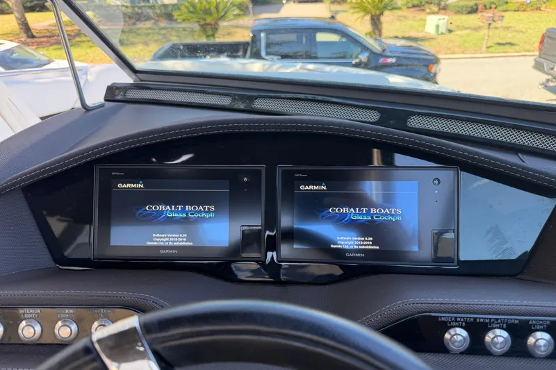 Slide: The Image of Dashboard of a 2017 Cobalt R3 boat featuring Garmin glass cockpit displays. - 20