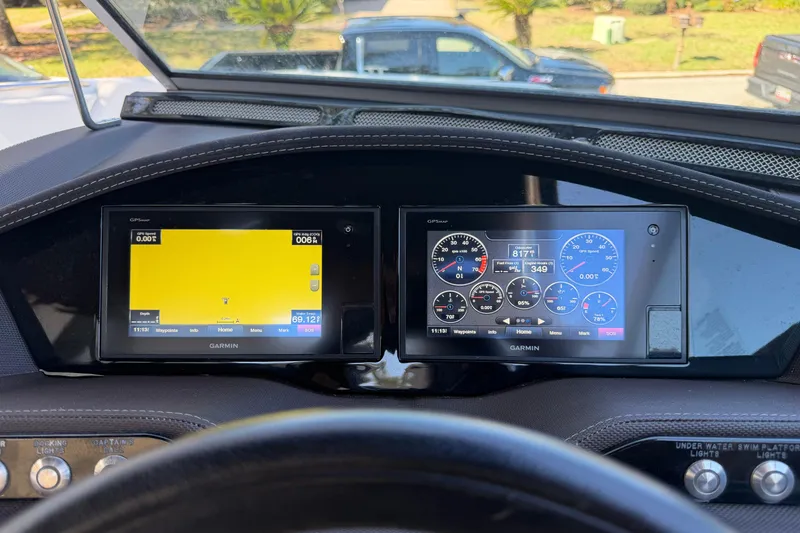 Slide: The Image of Dashboard of a 2017 Cobalt R3 with dual Garmin displays showing navigation and gauges. - 21