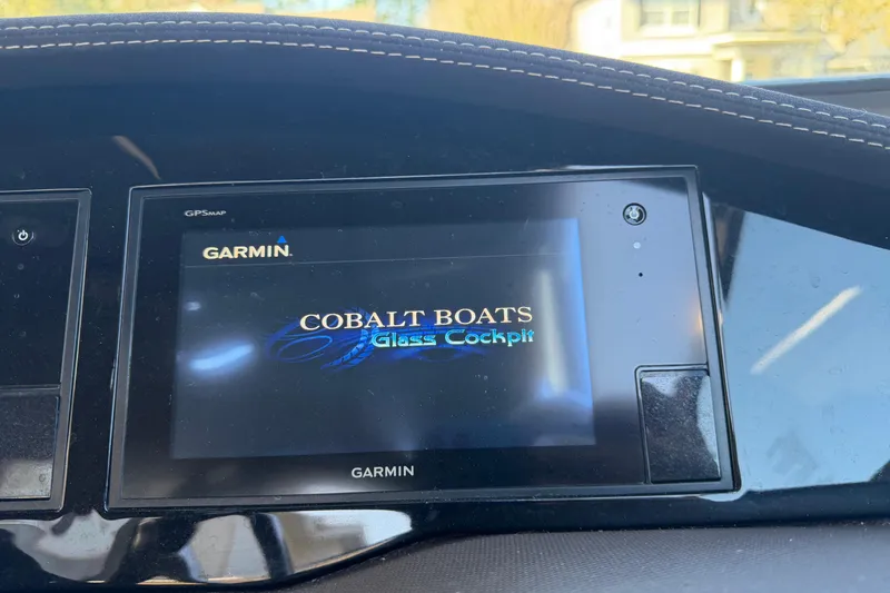 Slide: The Image of Garmin display in 2017 Cobalt R3 boat showing "Cobalt Boats Glass Cockpit" screen. - 23