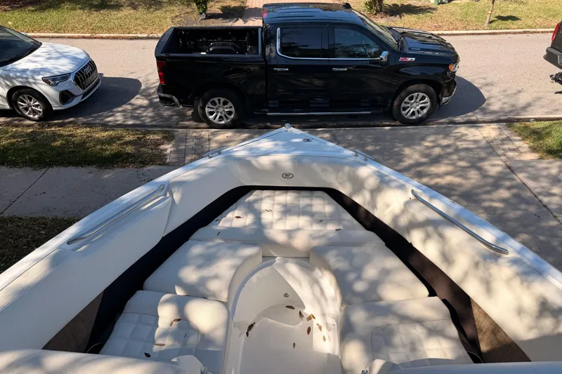 Slide: The Image of Bow of 2017 Cobalt R3 boat with parked cars in background. - 29