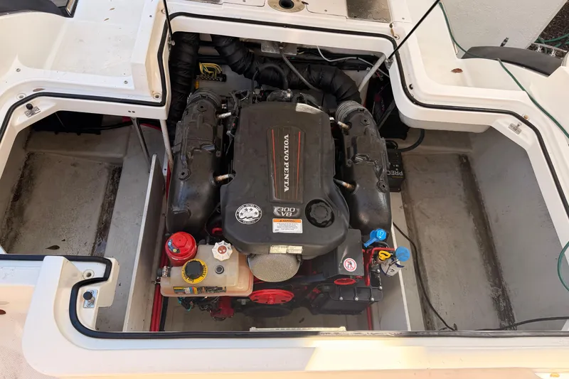 Slide: The Image of Engine compartment of a 2017 Cobalt R3 boat featuring a Volvo Penta V8 engine. - 33