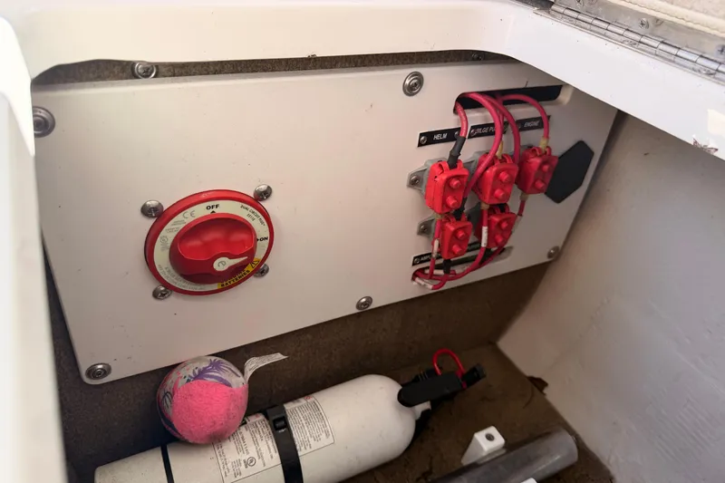 Slide: The Image of Electrical panel in a 2017 Cobalt R3 boat with switches and wiring. - 35