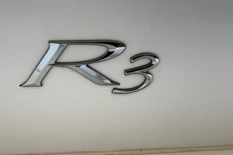Slide: The Image of Chrome "R3" emblem on a 2017 Cobalt model vehicle. - 7