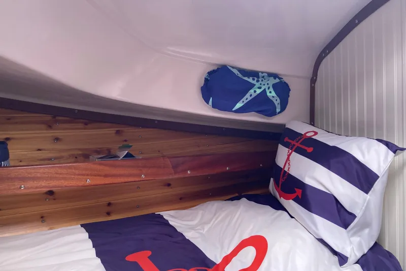 Slide: The Image of Interior of 1978 Prairie Boat Works 29 Coastal Cruiser with mini fridge and air purifier. - 22