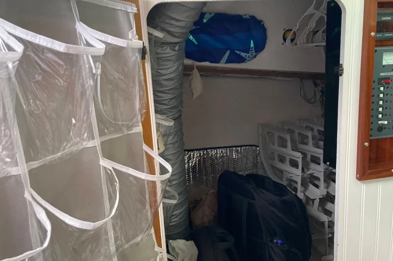 Slide: The Image of Nautical-themed bedding in 1978 Prairie Boat Works 29 Coastal Cruiser cabin. - 24