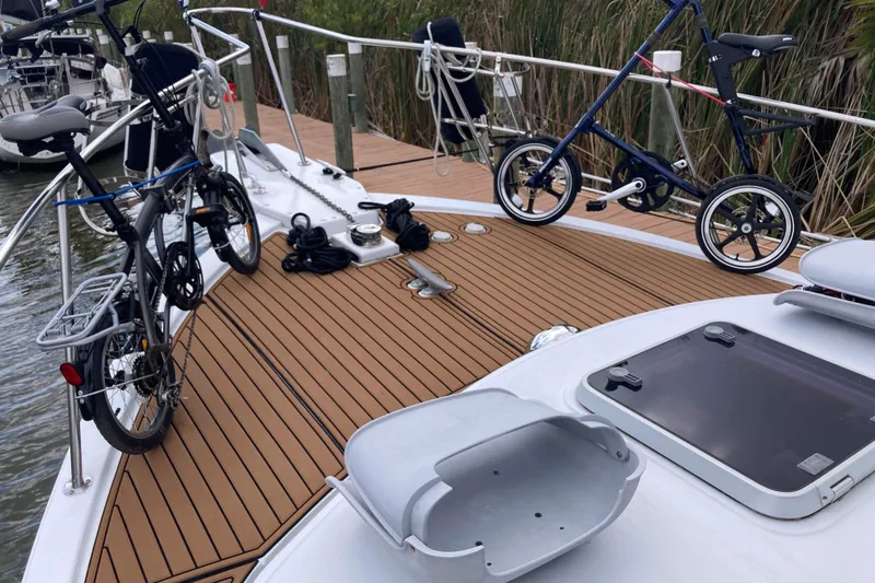 Slide: The Image of 1978 Prairie Boat Works 29 Coastal Cruiser under a canopy, side view. - 3