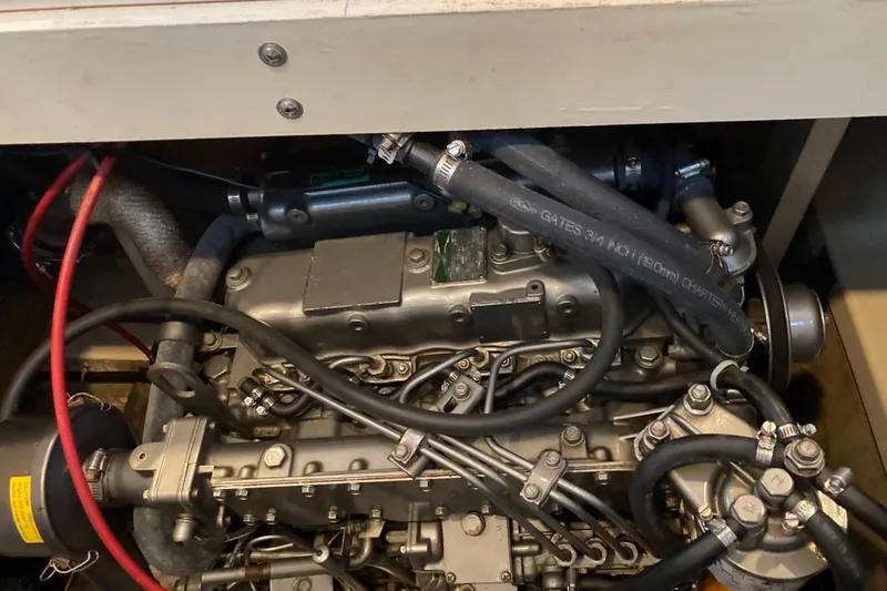 Slide: The Image of Engine compartment of a 1978 Prairie Boat Works 29 Coastal Cruiser, showing detailed components. - 30