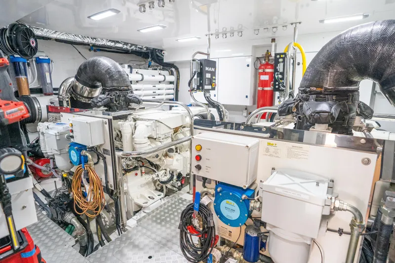 Slide: The Image of Engine room of 2021 Princess Y85 yacht, featuring advanced machinery and equipment. - 32