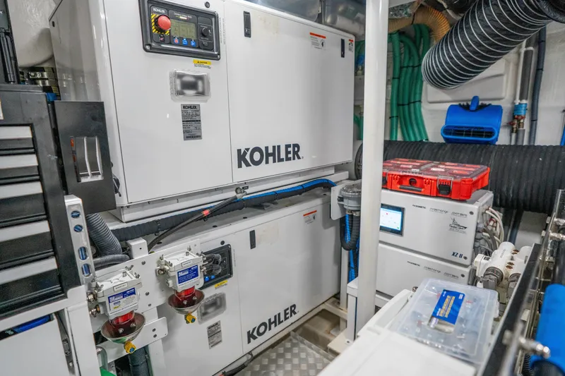 Slide: The Image of Engine room of 2021 Princess Y85 yacht featuring Kohler generators and advanced equipment. - 35