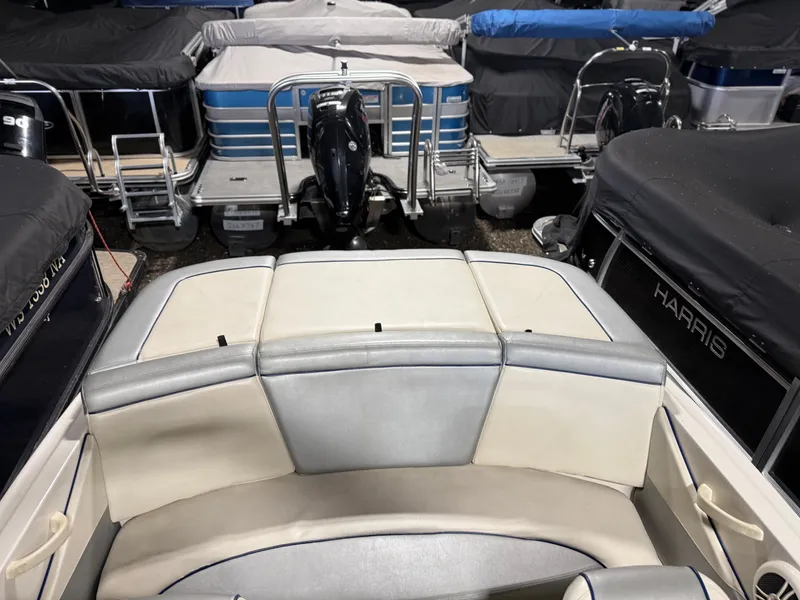 Slide: The Image of Interior of a 2009 Sea Ray 175 boat in a marina. - 15