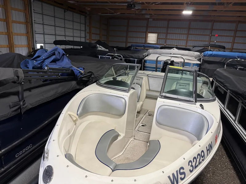 Slide: The Image of 2009 Sea Ray 175 boat in storage facility, interior view. - 2