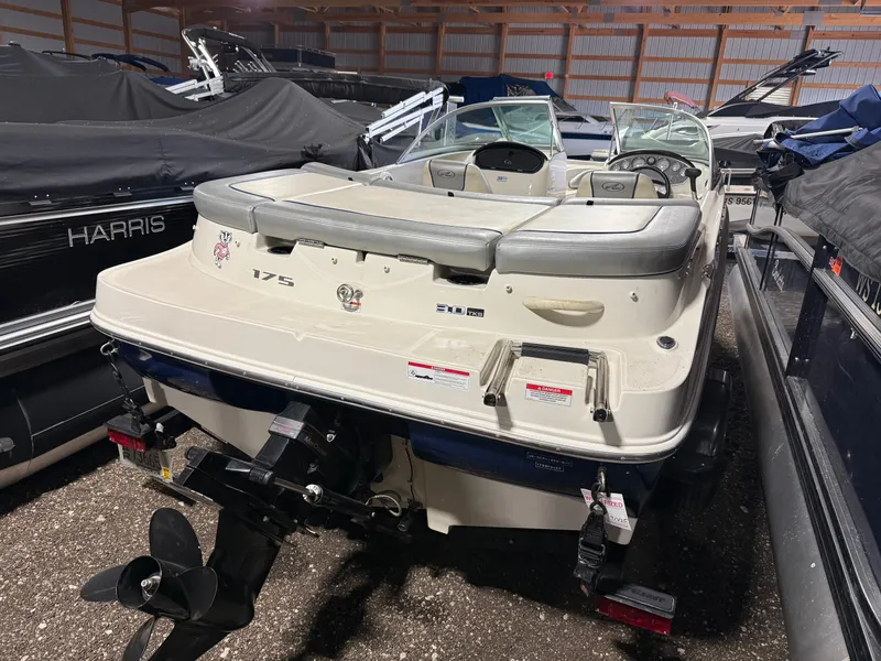 Slide: The Image of Rear view of a 2009 Sea Ray 175 boat in storage facility. - 3