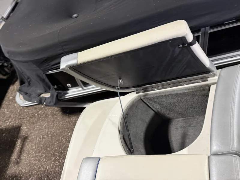 Slide: The Image of Open storage compartment on a 2009 Sea Ray 175 boat. - 8