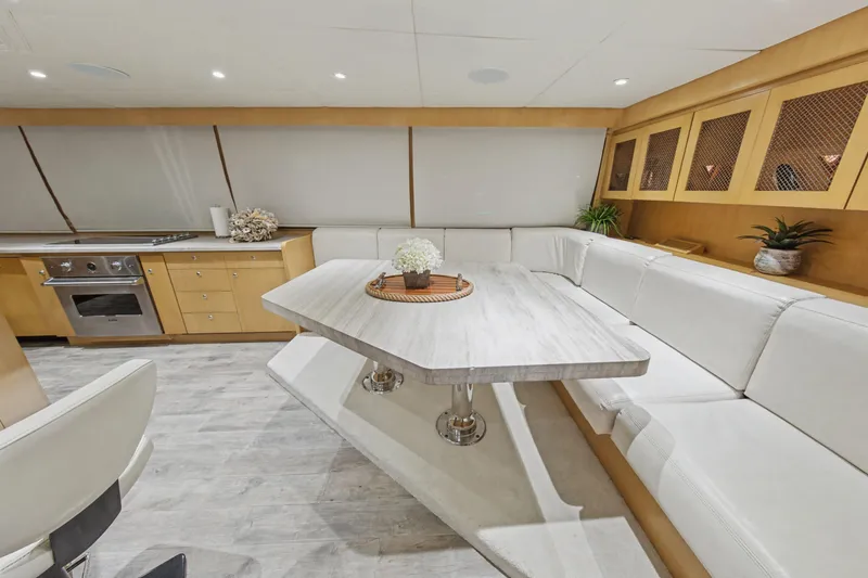 Slide: The Image of Luxurious interior of 2002 Ocean Alexander 120 Megayacht with modern helm and seating area. - 32