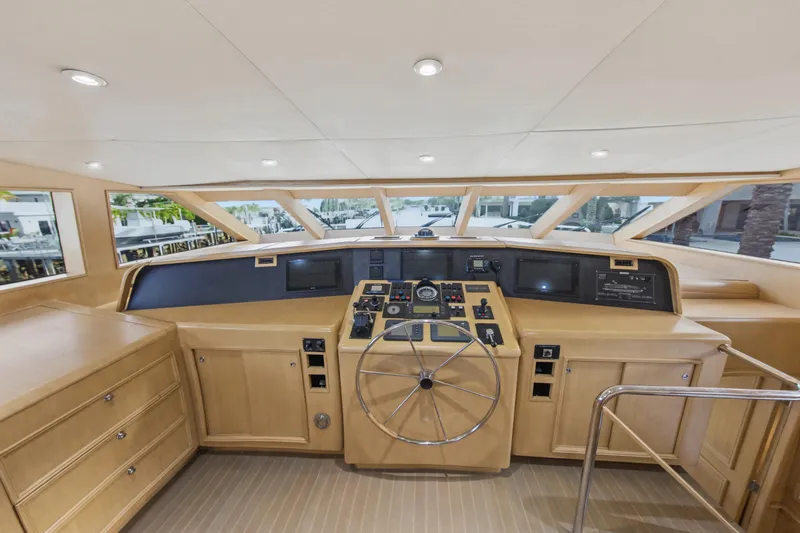 Slide: The Image of Luxurious interior of 2002 Ocean Alexander 120 Megayacht with elegant wood paneling and plush carpeting. - 35