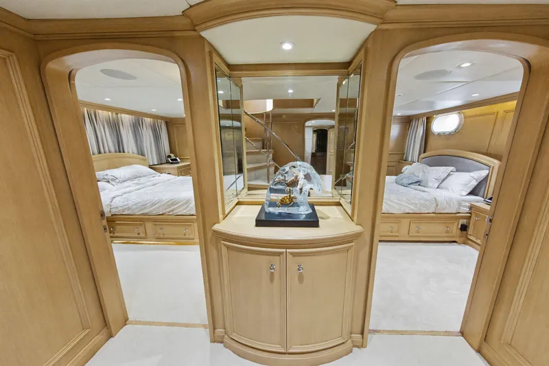 Slide: The Image of Luxurious bedroom interior of 2002 Ocean Alexander 120 Megayacht with elegant wood furnishings. - 37