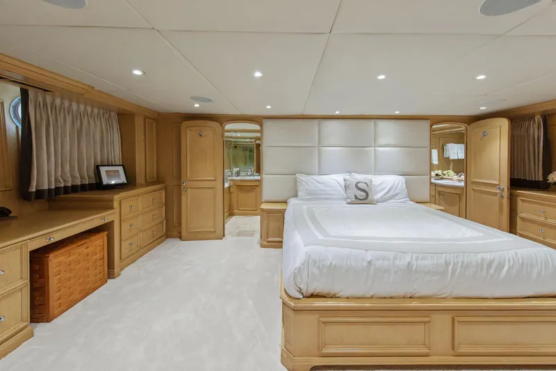 Slide: The Image of Luxurious bedroom interior of 2002 Ocean Alexander 120 Megayacht with elegant wood finishes. - 39