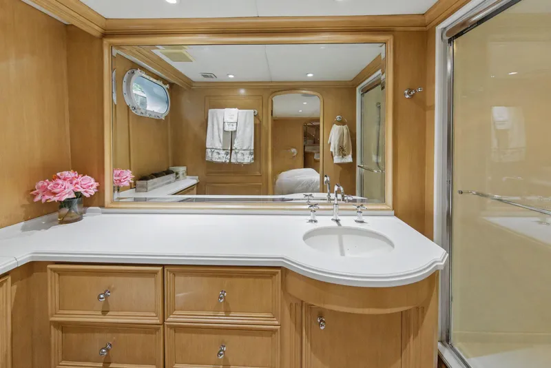Slide: The Image of Luxurious interior of 2002 Ocean Alexander 120 Megayacht with elegant wood paneling and plush seating. - 50