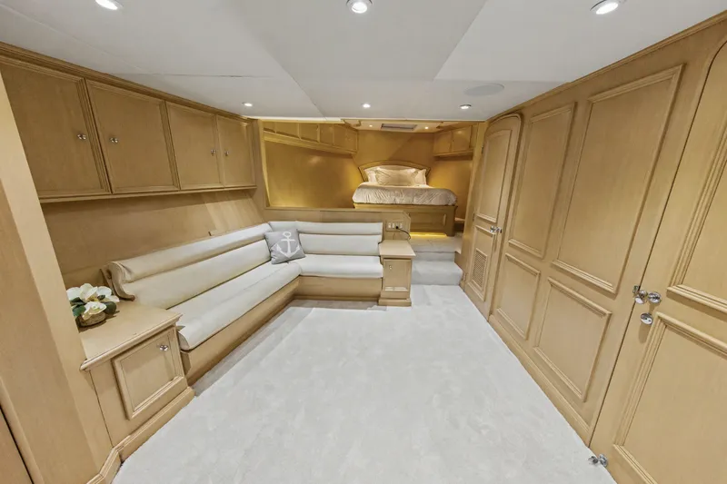 Slide: The Image of Luxurious bedroom in 2002 Ocean Alexander 120 Megayacht with elegant wood paneling. - 51