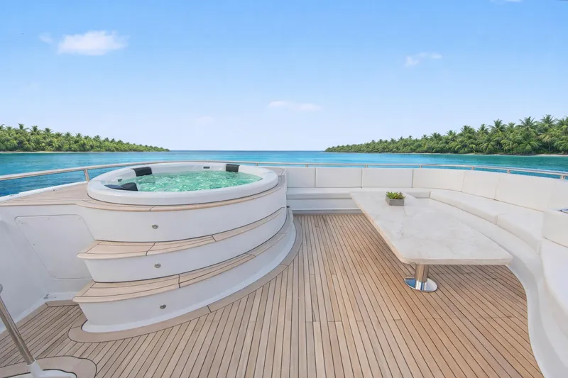 Slide: The Image of Luxurious deck of 2002 Ocean Alexander 120 Megayacht with elegant seating and ocean view. - 66