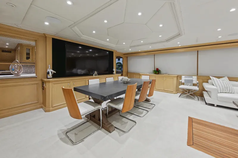 Slide: The Image of Luxurious interior of 2002 Ocean Alexander 120 Megayacht with elegant dining and seating area. - 9