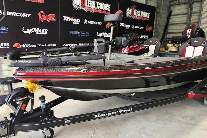 Slide: The Image of 2026 Ranger Z520R Cup-Equipped boat on trailer in showroom setting. - 5