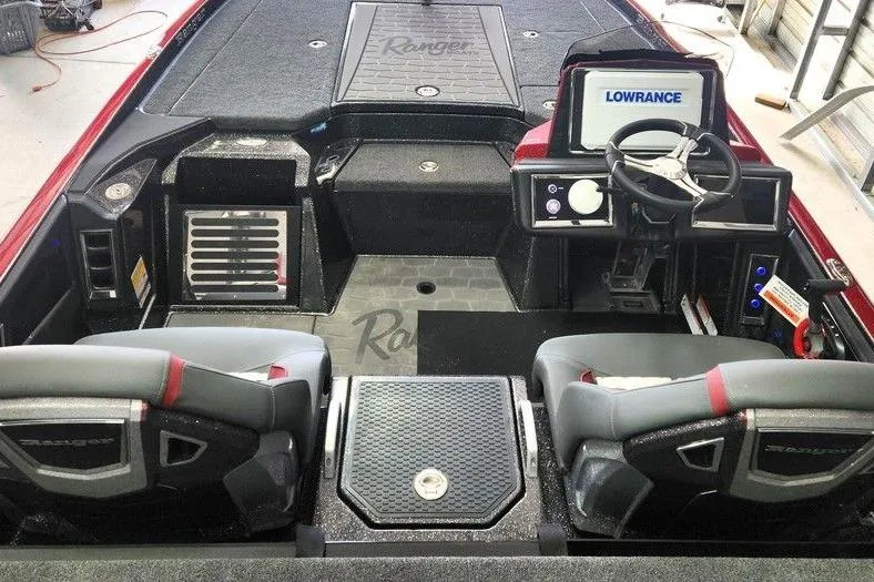 Slide: The Image of 2026 Ranger Z520R Cup-Equipped boat interior with Lowrance electronics and dual seating. - 6