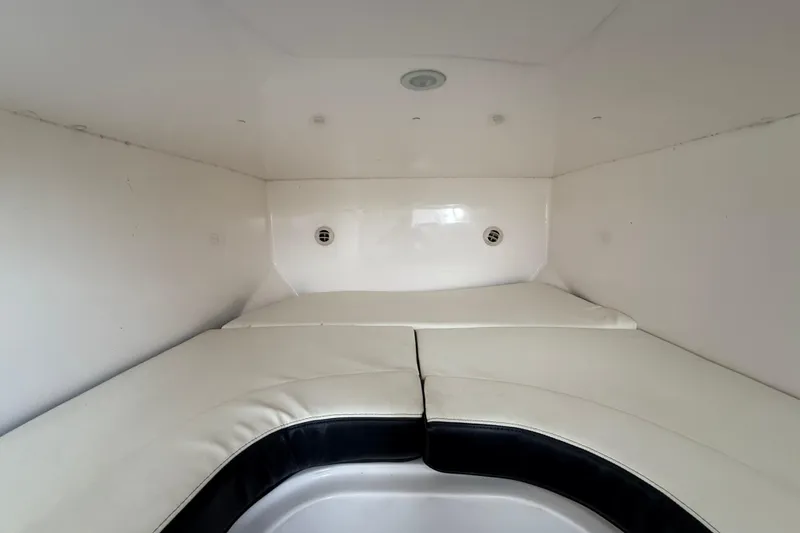 Slide: The Image of Interior cabin of 2020 Streamline 45 boat with cushioned seating. - 101