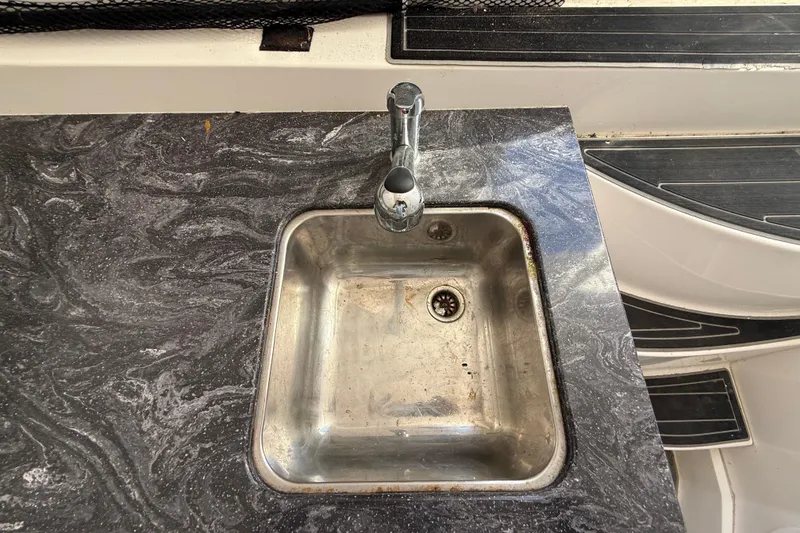 Slide: The Image of Stainless steel sink on marble countertop in 2020 Streamline 45 model. - 103