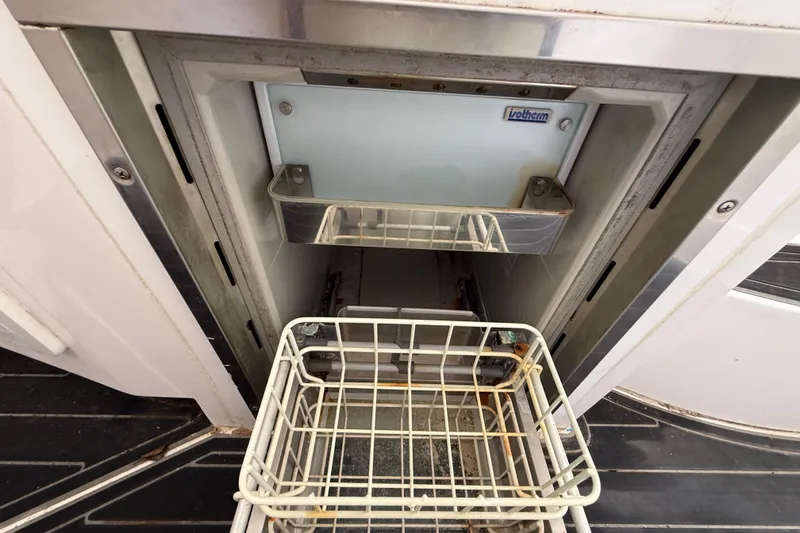 Slide: The Image of Open Streamline 45 appliance with visible interior compartments, 2020 model. - 105