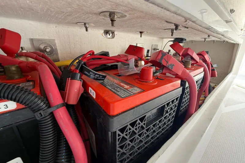 Slide: The Image of Red battery setup in a 2020 Streamline 45, featuring multiple cables and connectors. - 111