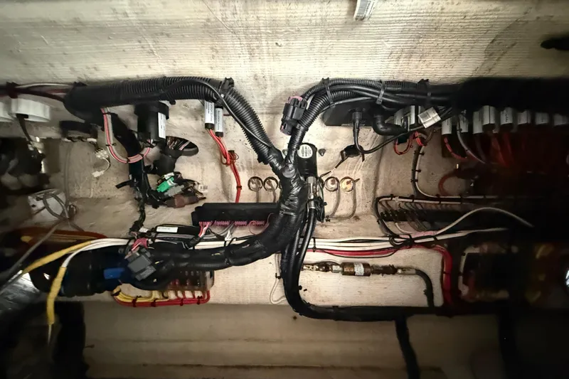 Slide: The Image of Electrical wiring system inside a 2020 Streamline 45 vehicle, showcasing complex cable arrangements. - 117