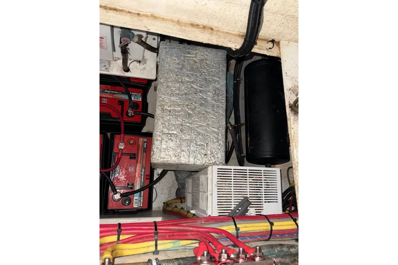 Slide: The Image of Electrical components and wiring inside a 2020 Streamline 45 boat. - 121