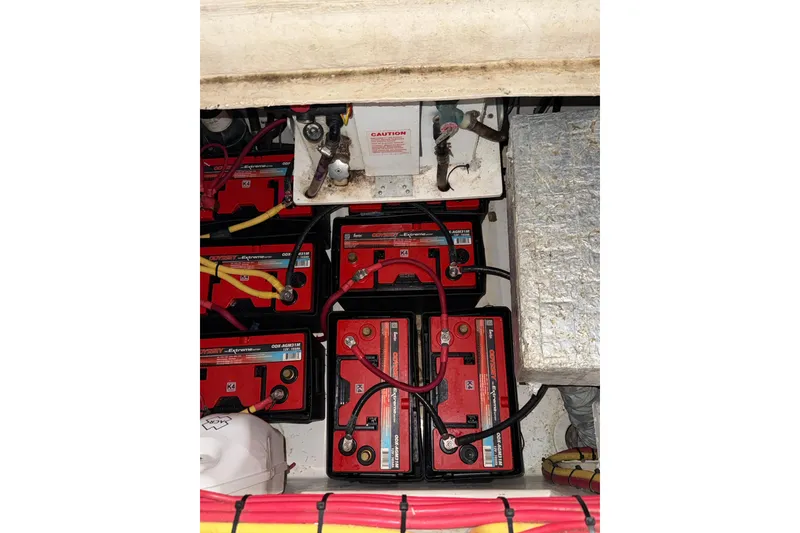 Slide: The Image of Battery compartment of a 2020 Streamline 45, featuring multiple Odyssey Extreme batteries. - 123