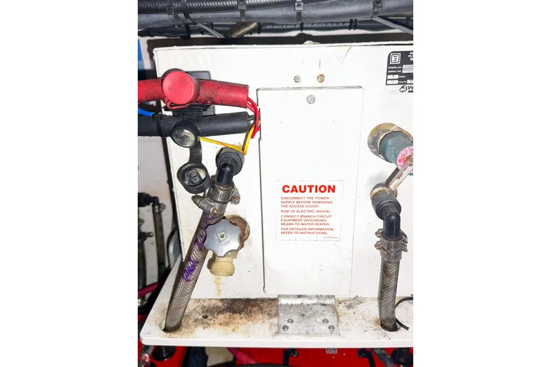 Slide: The Image of Streamline 45, 2020 model, electrical panel with caution label and wiring connections. - 124