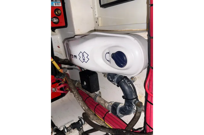Slide: The Image of Electrical panel with wiring and switch in a 2020 Streamline 45 model. - 125