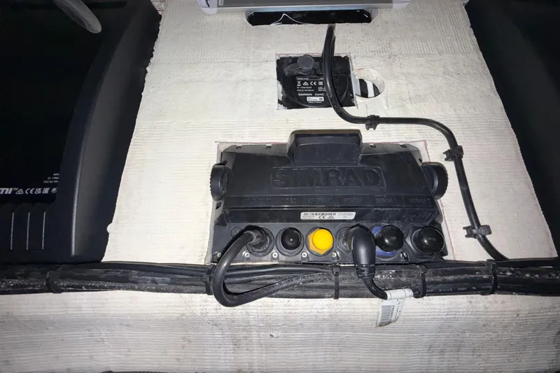 Slide: The Image of Electrical panel with Simrad device and cables in a 2020 Streamline 45 boat. - 129