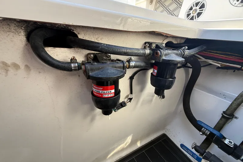 Slide: The Image of Fuel filters and hoses in a 2020 Streamline 45 boat engine compartment. - 142