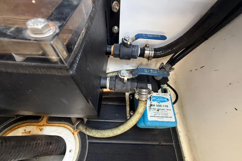 Slide: The Image of Air conditioning pump system with ball valves in a 2020 Streamline 45 model. - 144