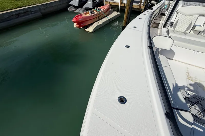 Slide: The Image of Streamline 45 boat docked near a red kayak, 2020 model. - 27