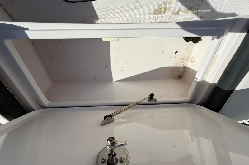 Slide: The Image of Open storage compartment in 2020 Streamline 45 boat, showing interior details. - 37