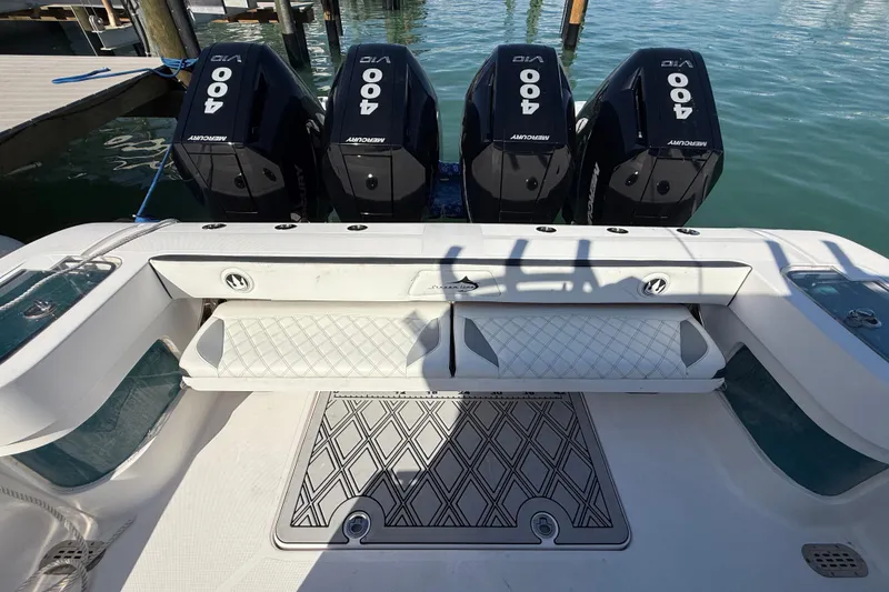 Slide: The Image of Four Mercury 400 engines on a 2020 Streamline 45 boat at a dock. - 44
