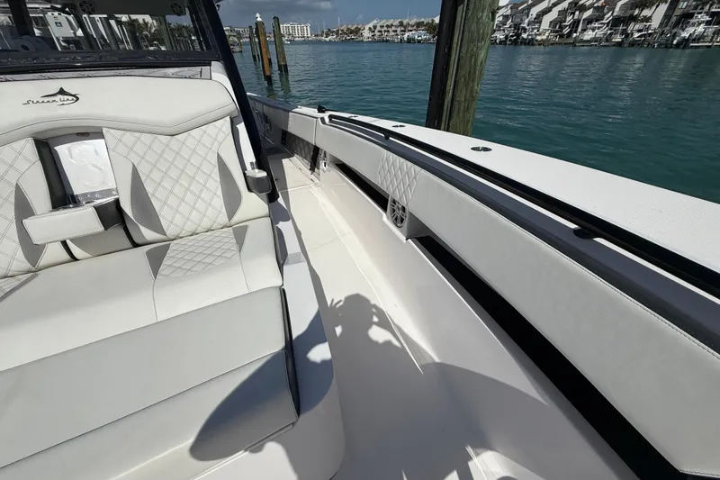 Slide: The Image of Luxurious interior of 2020 Streamline 45 boat with white seating and waterfront view. - 47